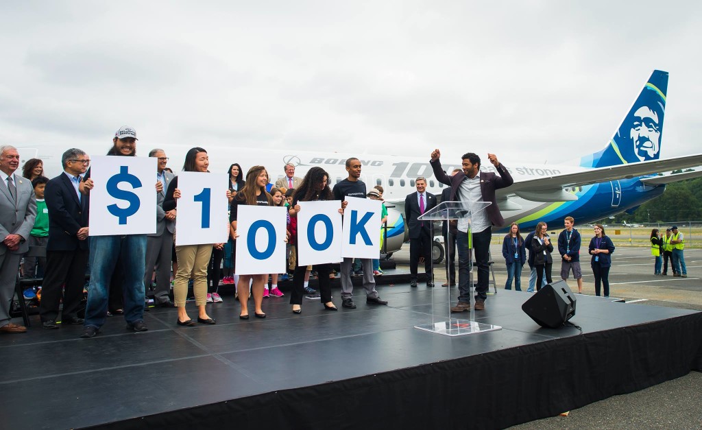 Alaska Airlines and local business leaders present a $100,000 donation to the Washington State Opportunity Scholarship in Boeing's name.